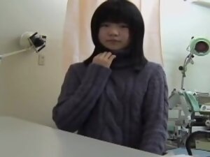 Young Japanese girl reaches an orgasm at her gyno.s office