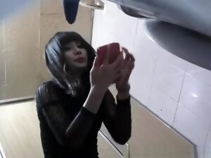 Asian woman takes a pee