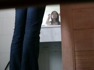 Public bathroom spy camera catches an Asian girl pissing